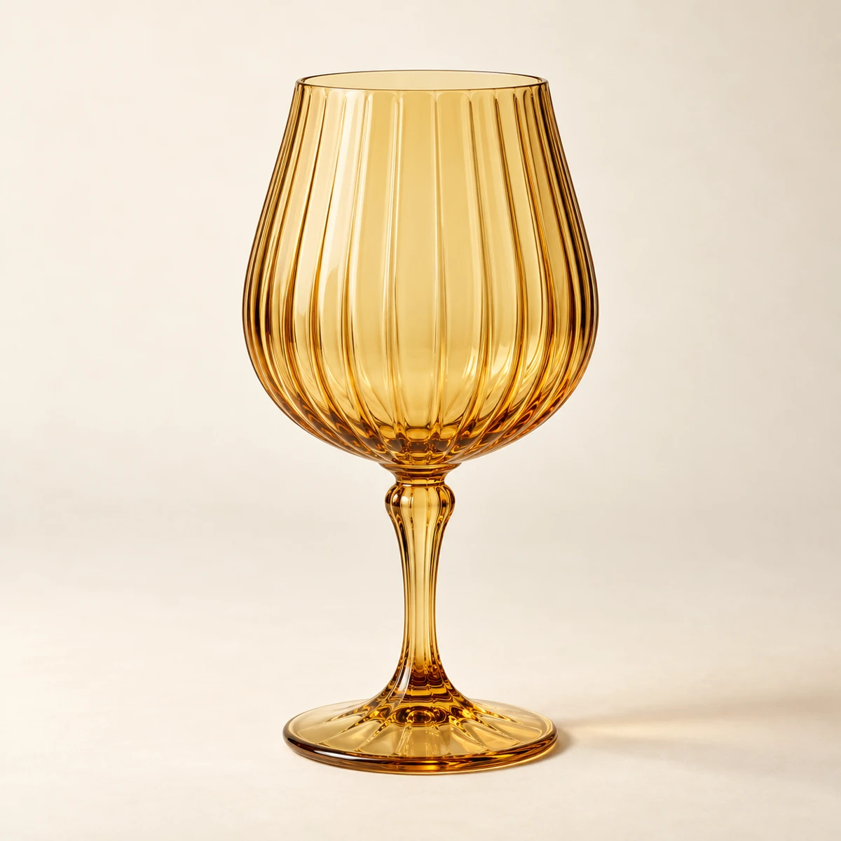 Solenne Wine Glass — Golden Amber, tulip bowl · broad vertical ribs